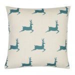 Photo of 45cm x 45cm square cushion with teal Christmas reindeers