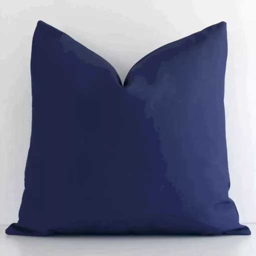 A gorgeous outdoor square cushion in navy. It has an eye-catching solid-coloured design.