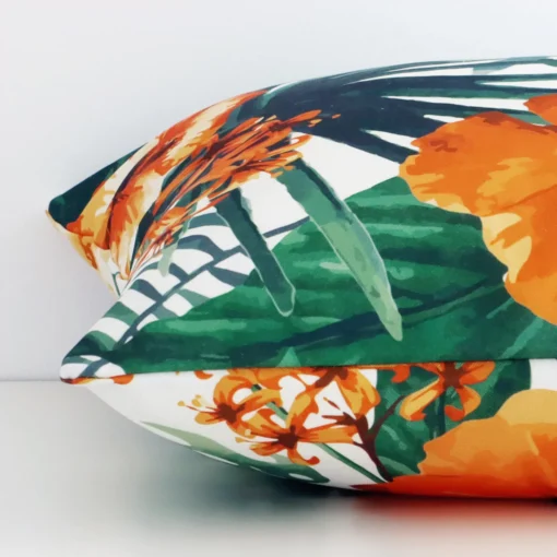 A side view of orange solid-coloured cushion that has outdoor fabric and a square size.