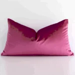 A superior velvet blush cushion cover yielding a solid-coloured style and in a classy rectangle size.