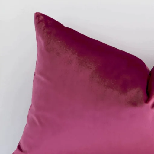 Zoomed photo of the top left corner of this blush solid-coloured cushion cover. The image clearly shows the velvet material and rectangle dimensions.