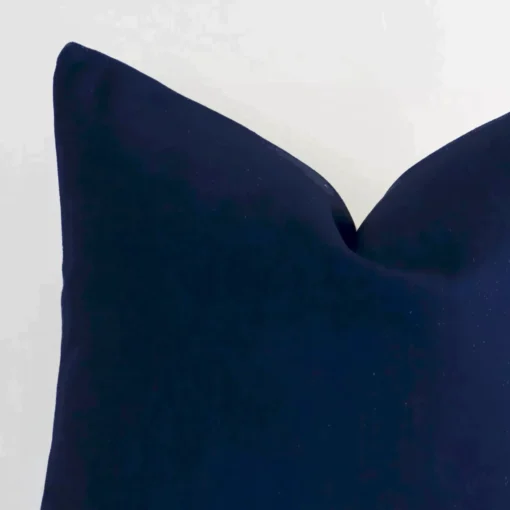 A detailed shot of this dark blue solid-coloured cushion cover that has linen fabric and a large size.